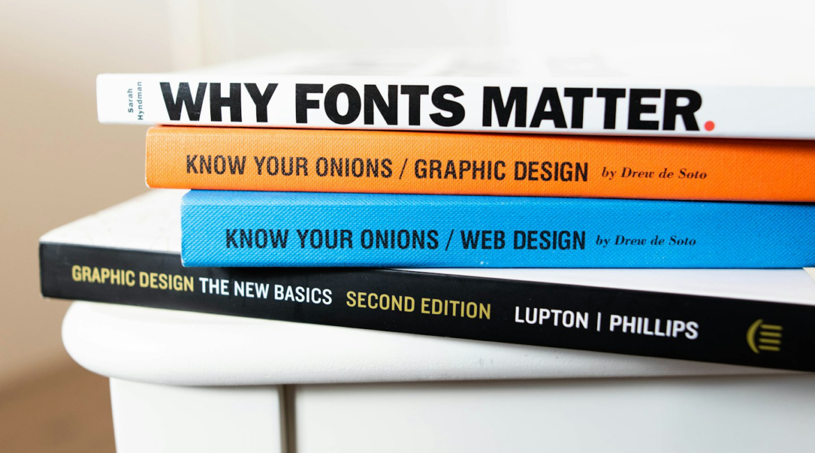 A stack of design books for the graphic designer.